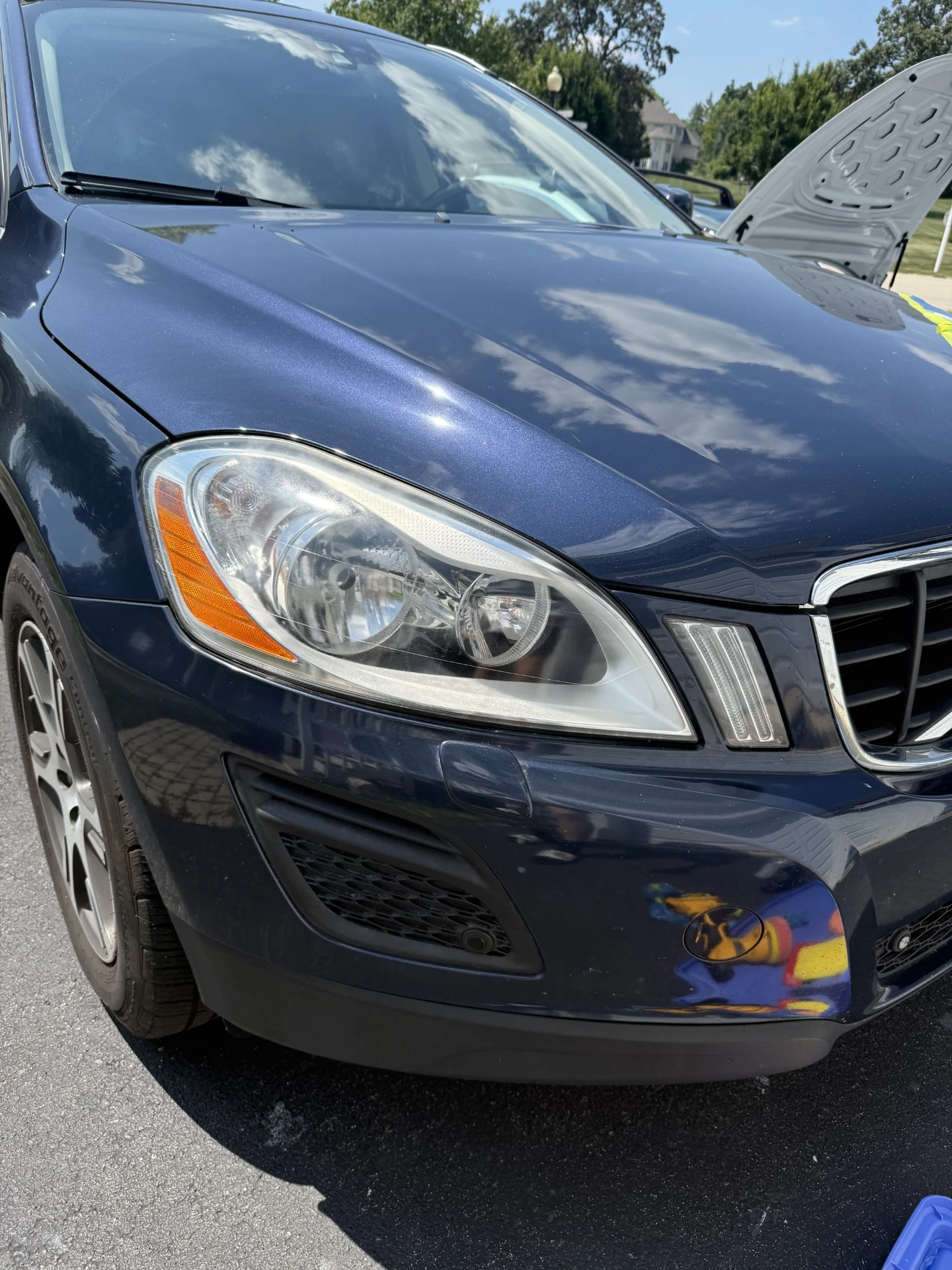 After: lens clarity restored with reflective gloss